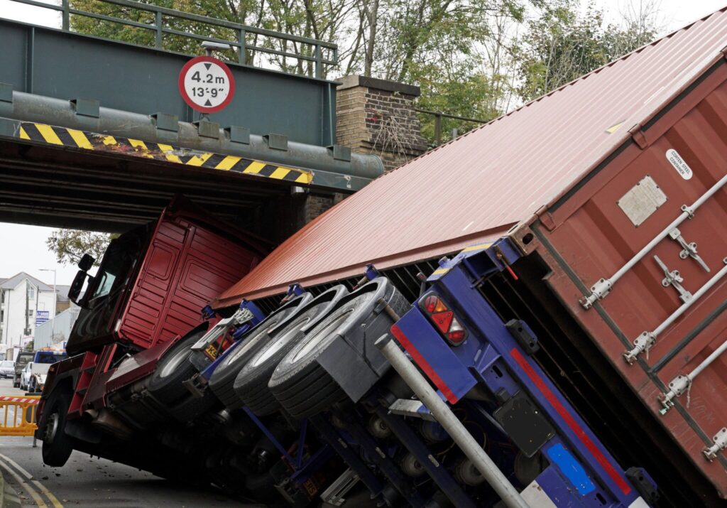 A lorry which has struck a bridge in Kent