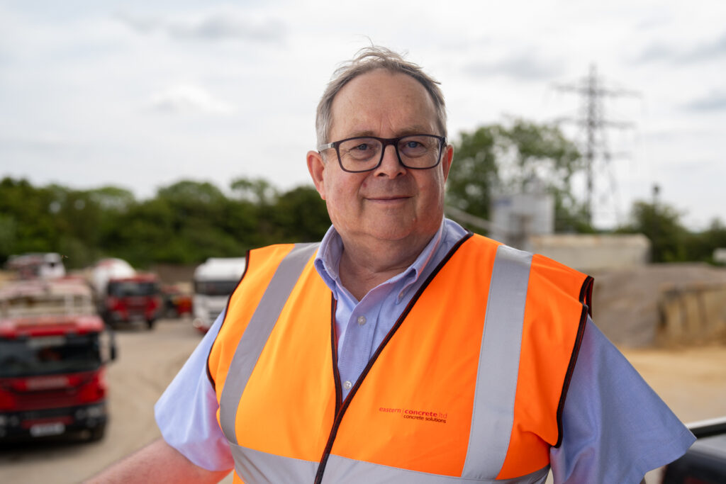 Tom Baker, Managing Director of Eastern Concrete Ltd in a high-vis vest at Sizewell C