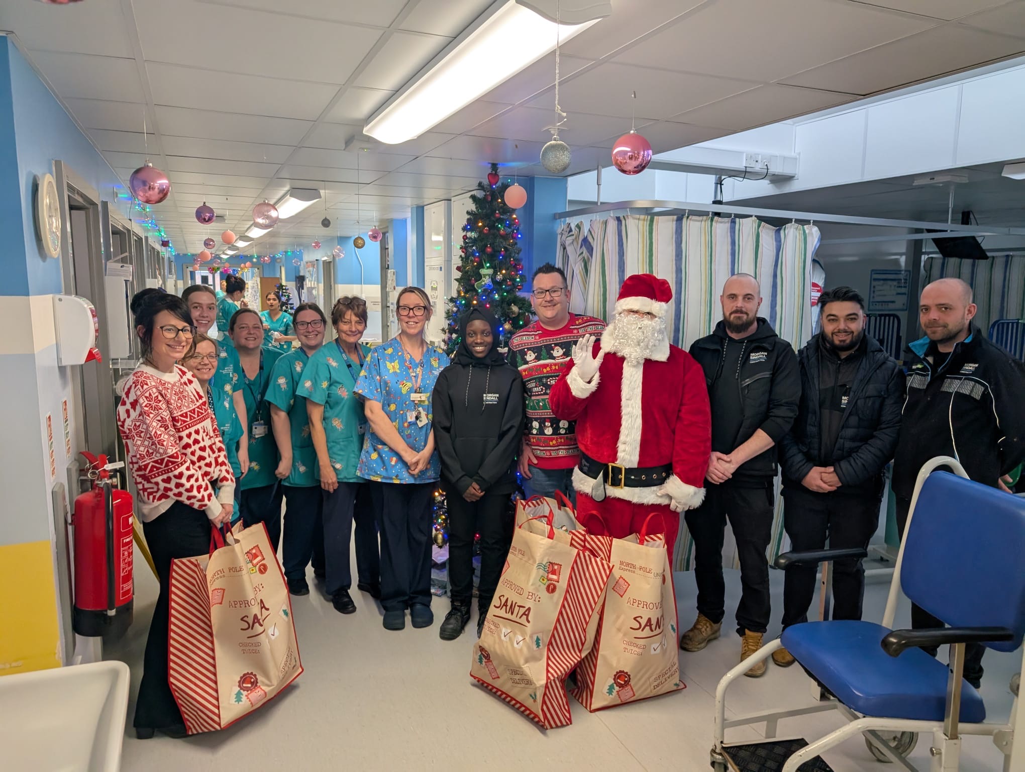 Father Christmas visits James Paget Hospital wards to spread festive ...