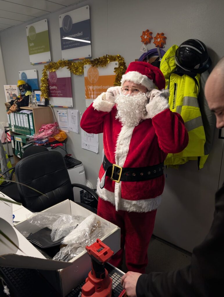 Father Christmas prepares to visit the wards. Credit: LDD