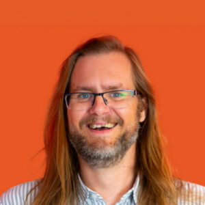 Adam Howlett - News Editor In Circle Frame